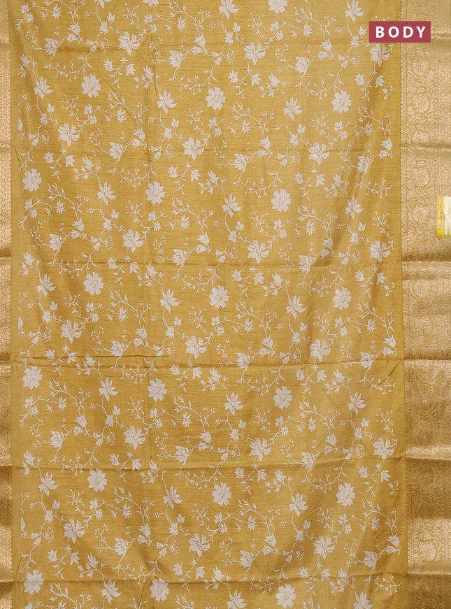 Semi dola saree pale yellow with allover prints and zari woven border