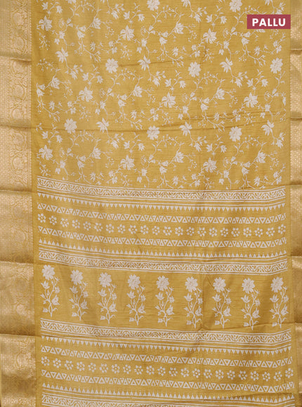 Semi dola saree pale yellow with allover prints and zari woven border