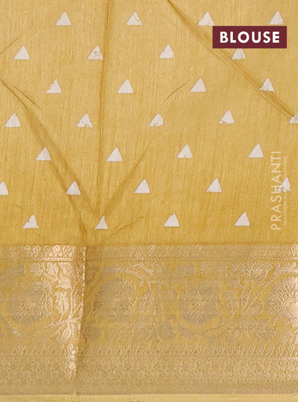 Semi dola saree pale yellow with allover prints and zari woven border