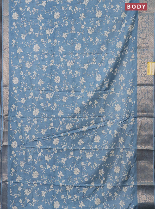 Semi dola saree blue shade with allover prints and zari woven border