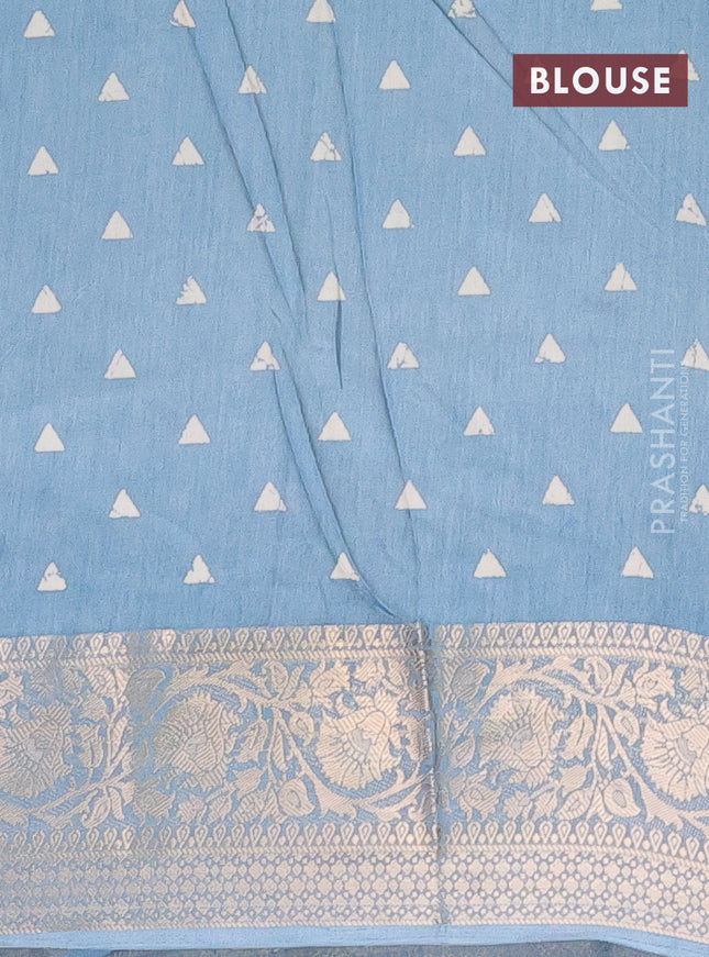 Semi dola saree blue shade with allover prints and zari woven border