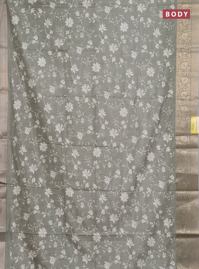 Semi dola saree pastel green with allover prints and zari woven border