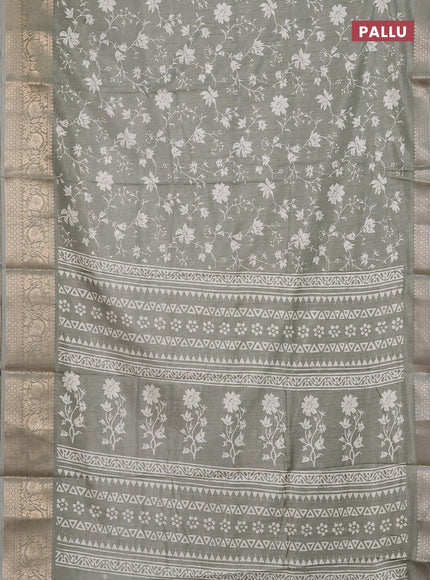 Semi dola saree pastel green with allover prints and zari woven border