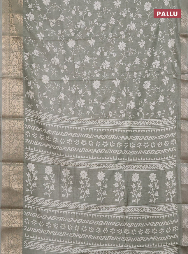 Semi dola saree pastel green with allover prints and zari woven border