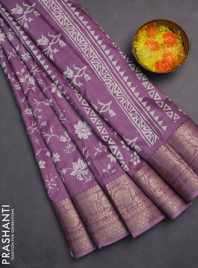Semi dola saree lavender with allover prints and zari woven border