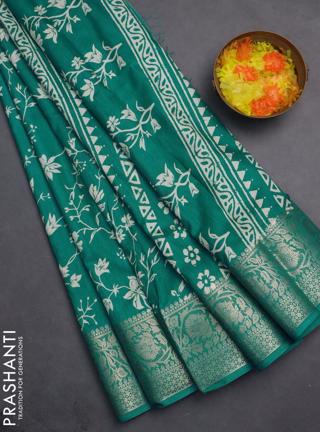 Semi dola saree teal blue with allover prints and zari woven border