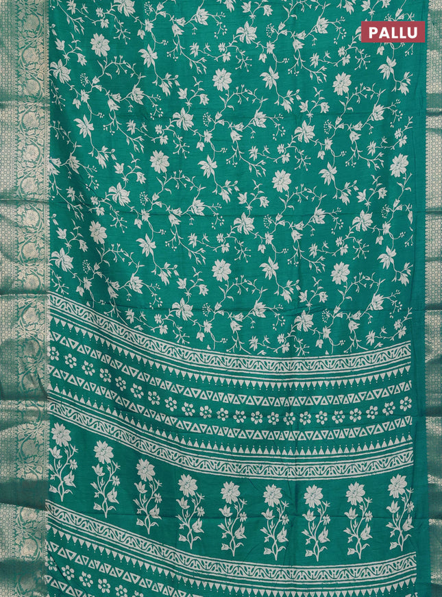 Semi dola saree teal blue with allover prints and zari woven border