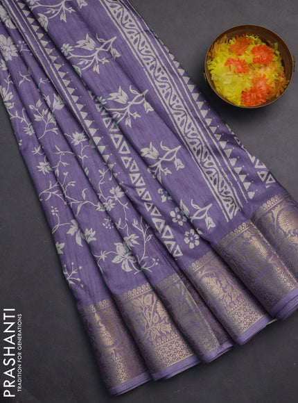 Semi dola saree pastel lavender with allover prints and zari woven border