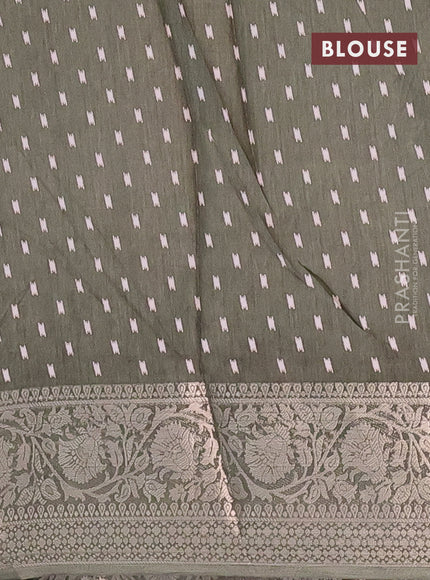 Semi dola saree military green with allover prints and zari woven border