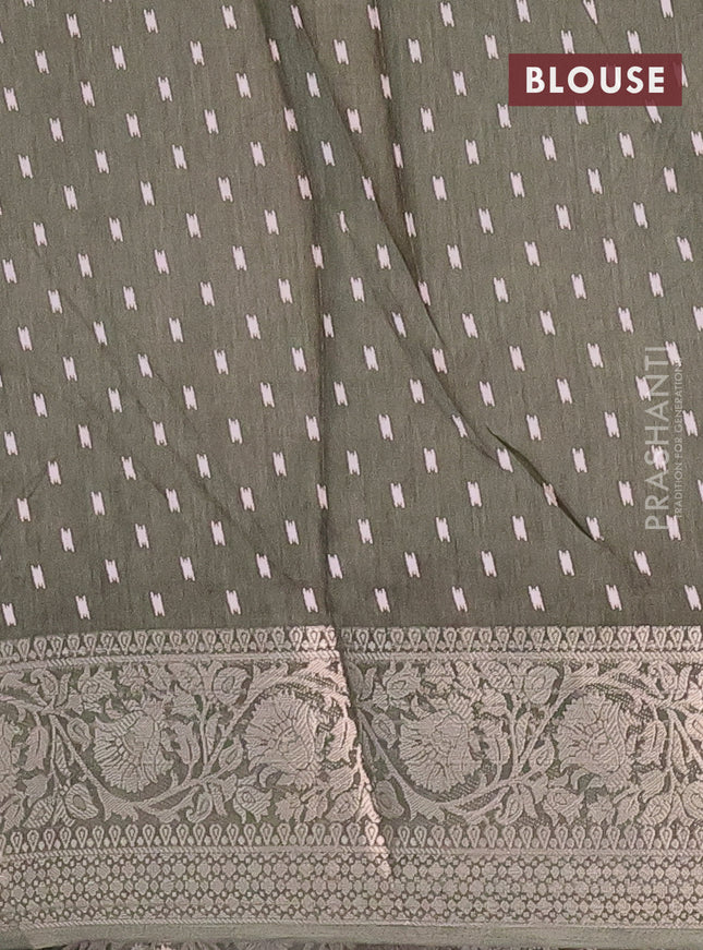 Semi dola saree military green with allover prints and zari woven border