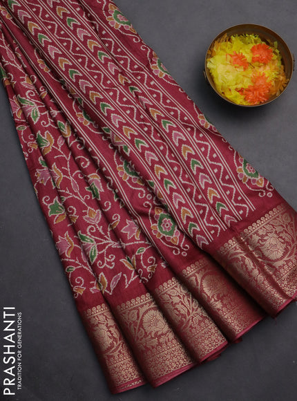 Semi dola saree maroon with allover prints and zari woven border
