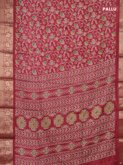 Semi dola saree maroon with allover prints and zari woven border