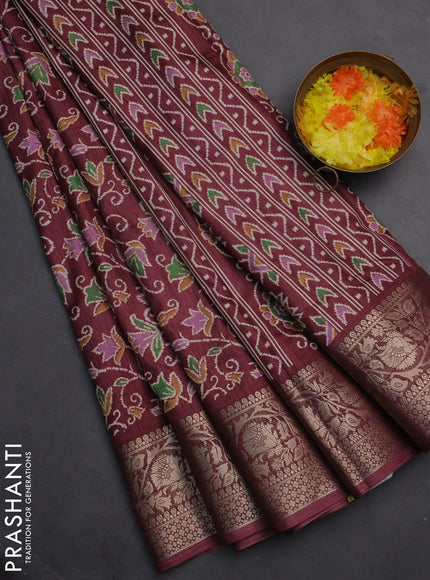 Semi dola saree maroon with allover prints and zari woven border