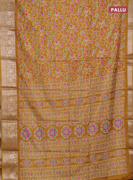 Semi dola saree mustard yellow with allover prints and zari woven border