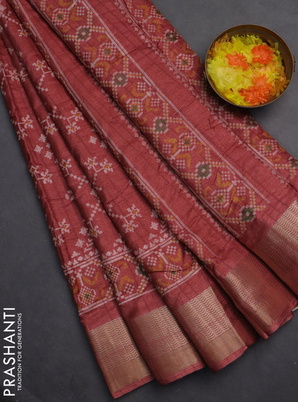 Semi dola saree peach shade with ikat prints and zari woven border