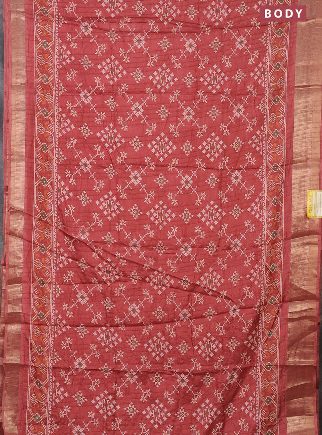 Semi dola saree peach shade with ikat prints and zari woven border