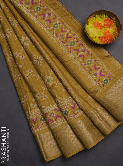 Semi dola saree mustard shade with ikat prints and zari woven border