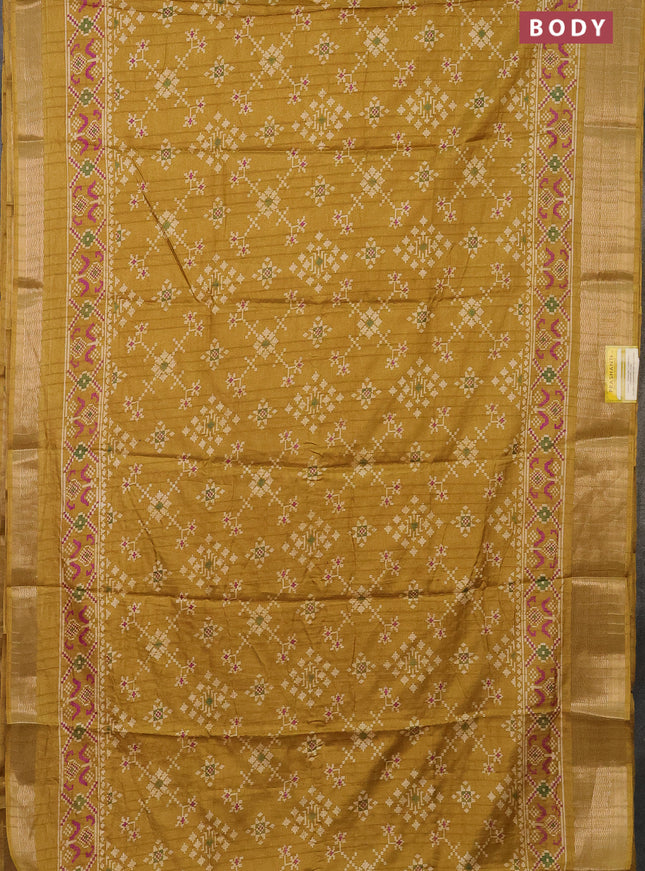 Semi dola saree mustard shade with ikat prints and zari woven border