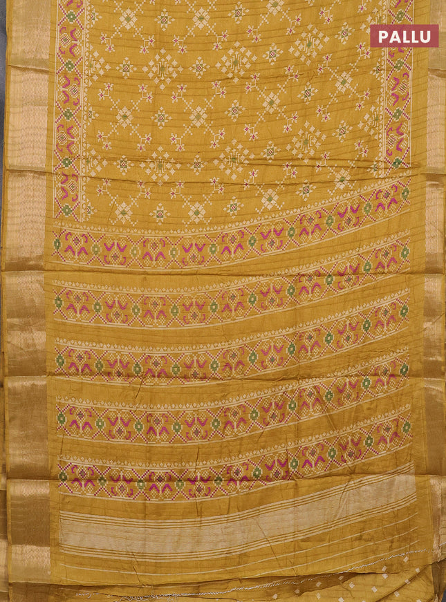Semi dola saree mustard shade with ikat prints and zari woven border