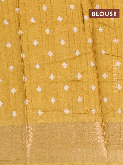 Semi dola saree mustard shade with ikat prints and zari woven border