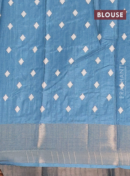 Semi dola saree blue shade with ikat prints and zari woven border