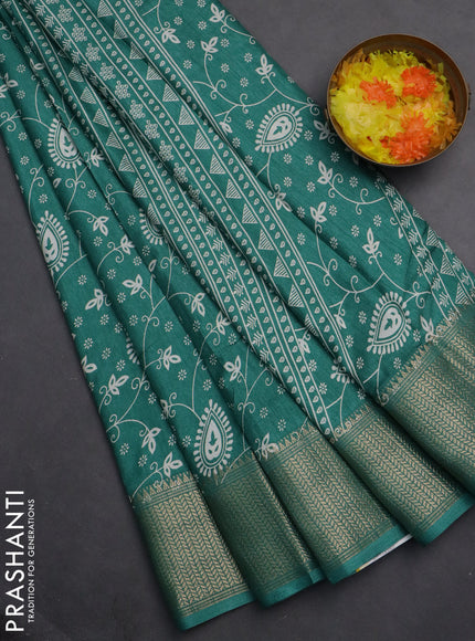 Semi dola saree teal green with allover prints and zari woven border