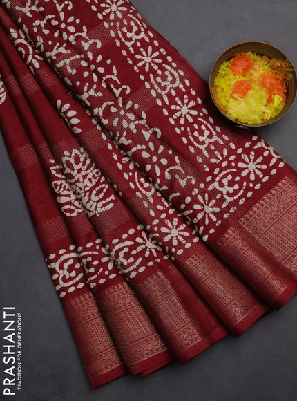 Semi dola saree maroon with zari weaves & batik prints and zari woven border