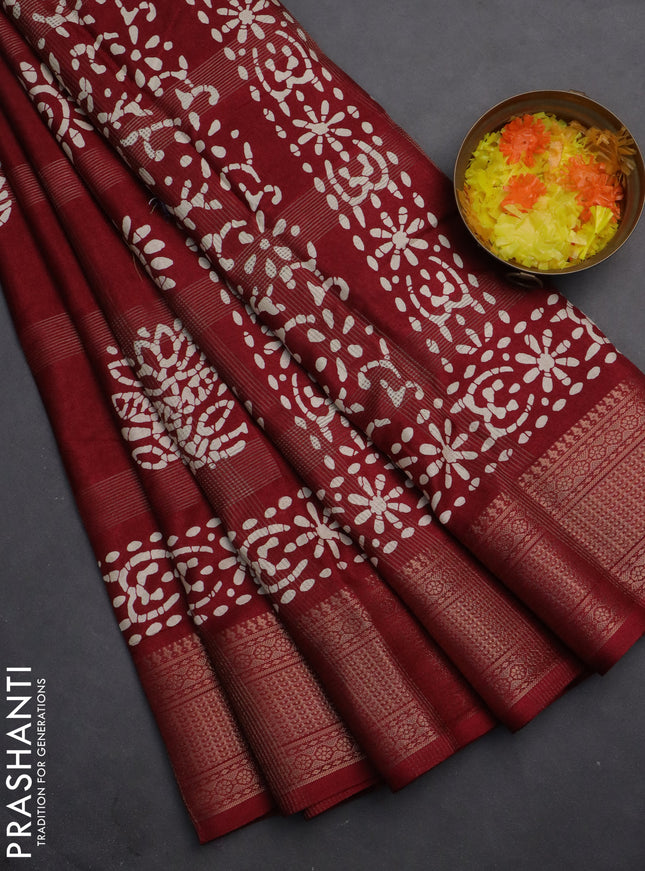 Semi dola saree maroon with zari weaves & batik prints and zari woven border