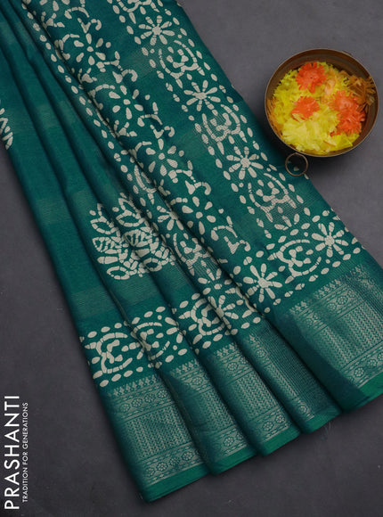 Semi dola saree teal green with zari weaves & batik prints and zari woven border