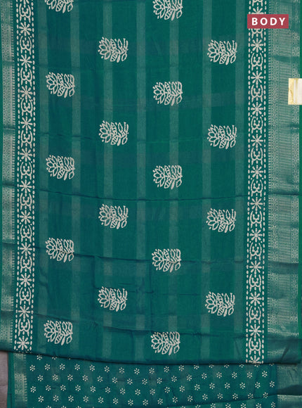 Semi dola saree teal green with zari weaves & batik prints and zari woven border