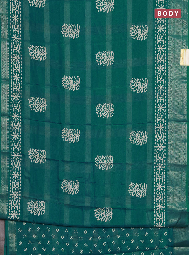 Semi dola saree teal green with zari weaves & batik prints and zari woven border