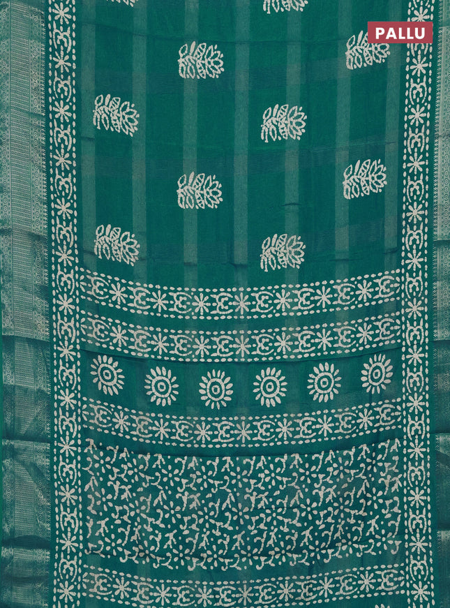 Semi dola saree teal green with zari weaves & batik prints and zari woven border