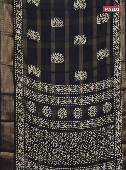 Semi dola saree black with zari weaves & batik prints and zari woven border