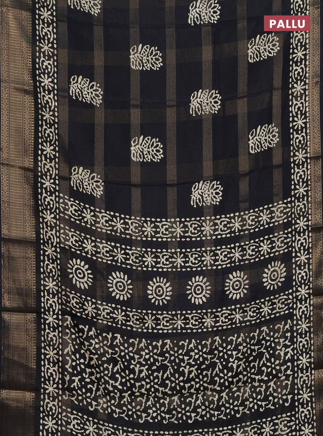 Semi dola saree black with zari weaves & batik prints and zari woven border