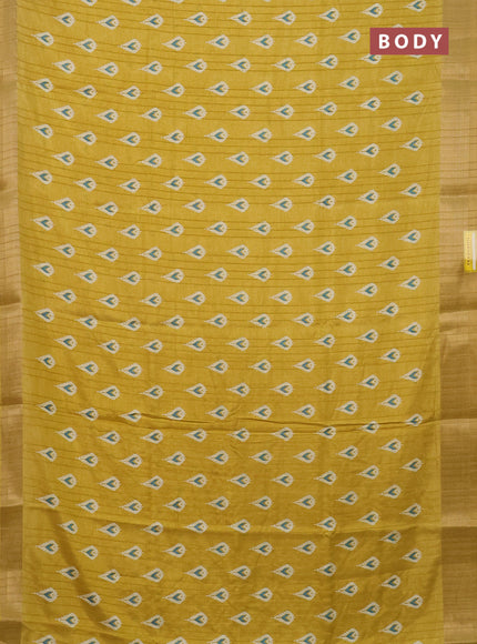 Semi dola saree pale yellow with butta prints and zari woven border