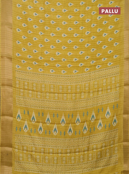 Semi dola saree pale yellow with butta prints and zari woven border