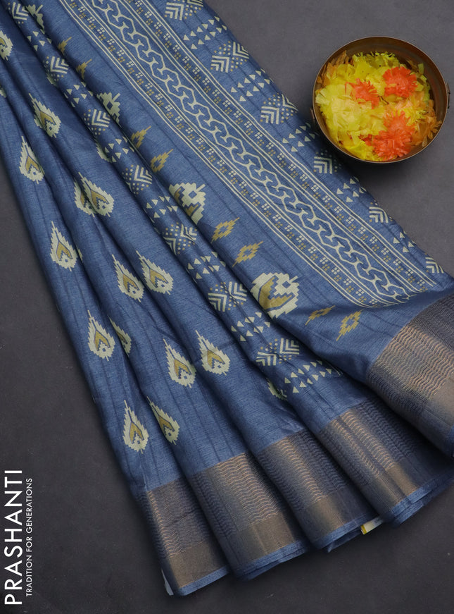 Semi dola saree blue shade with butta prints and zari woven border