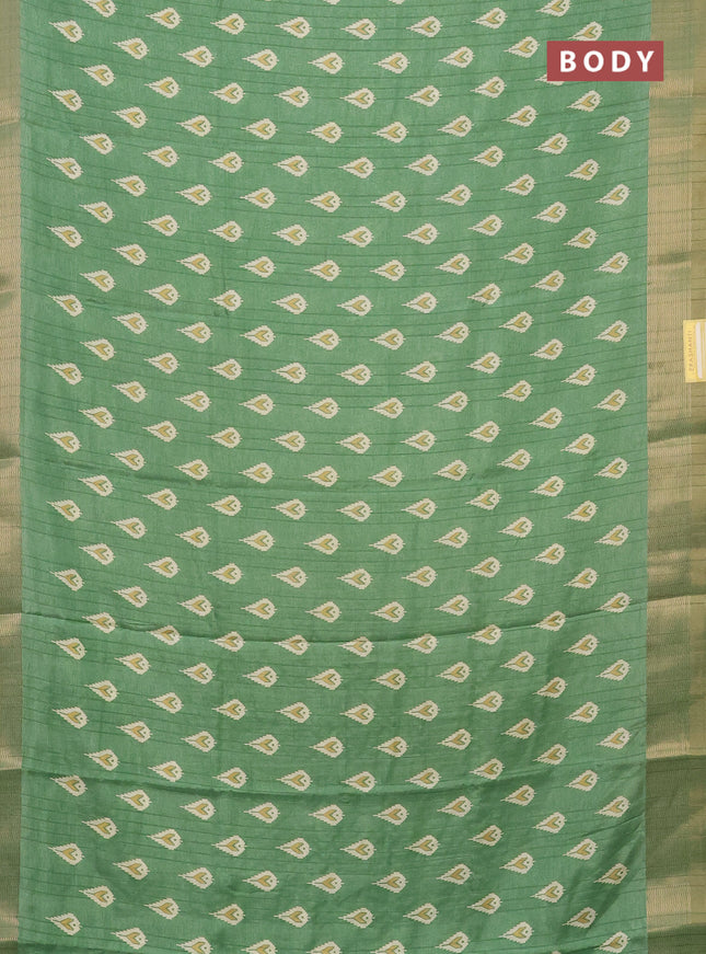 Semi dola saree green with butta prints and zari woven border