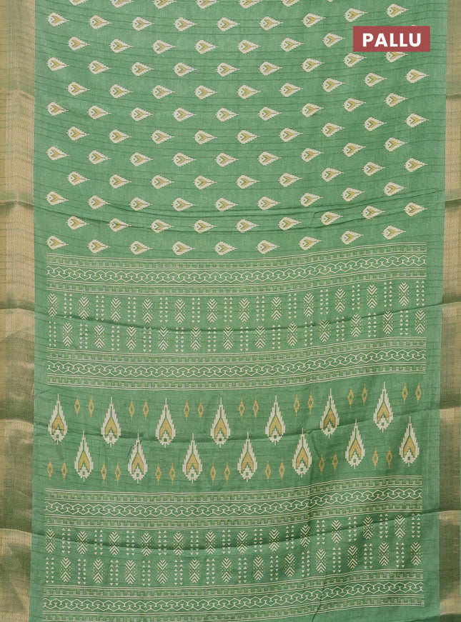 Semi dola saree green with butta prints and zari woven border
