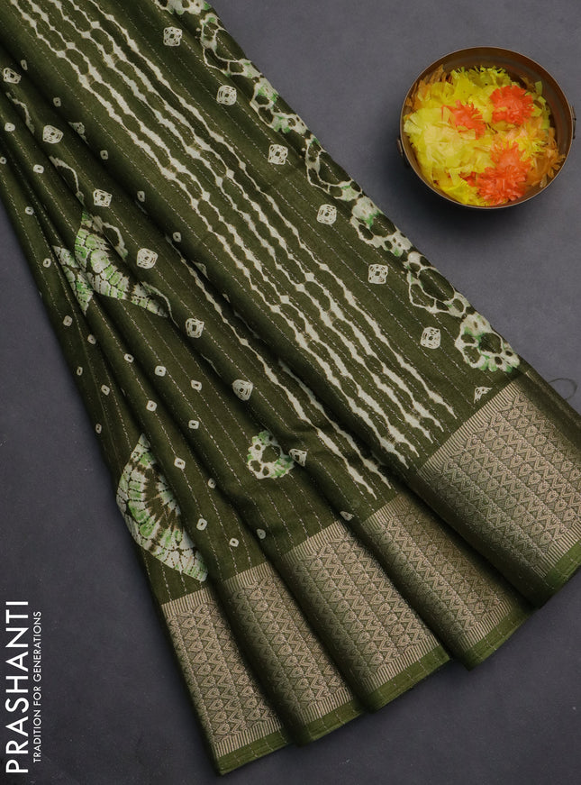 Semi dola saree mehendi green with allover zari weaves & batik prints and zari woven border