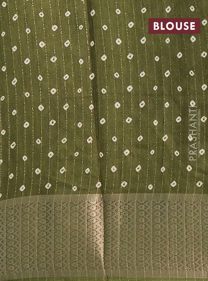 Semi dola saree mehendi green with allover zari weaves & batik prints and zari woven border