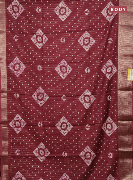 Semi dola saree maroon with allover zari weaves & batik prints and zari woven border