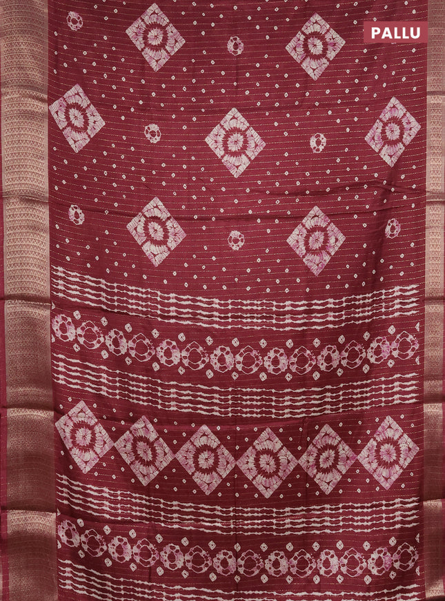 Semi dola saree maroon with allover zari weaves & batik prints and zari woven border