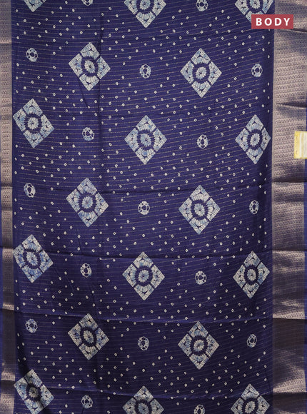 Semi dola saree navy blue with allover zari weaves & batik prints and zari woven border