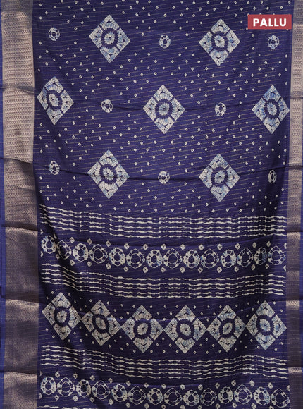 Semi dola saree navy blue with allover zari weaves & batik prints and zari woven border