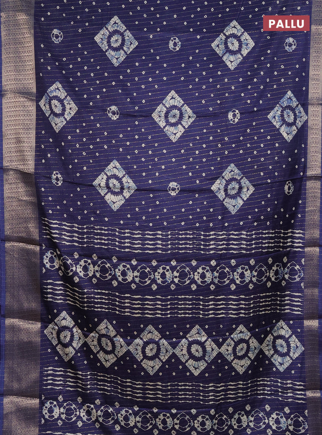 Semi dola saree navy blue with allover zari weaves & batik prints and zari woven border
