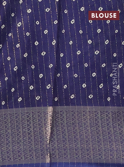Semi dola saree navy blue with allover zari weaves & batik prints and zari woven border