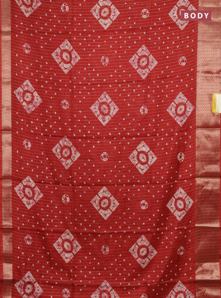 Semi dola saree maroon with allover zari weaves & batik prints and zari woven border