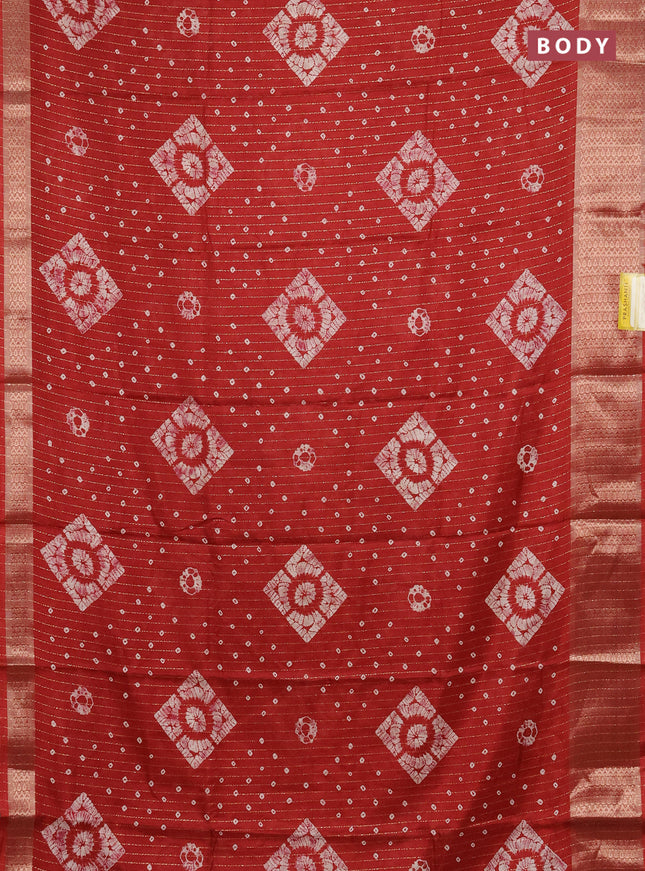 Semi dola saree maroon with allover zari weaves & batik prints and zari woven border