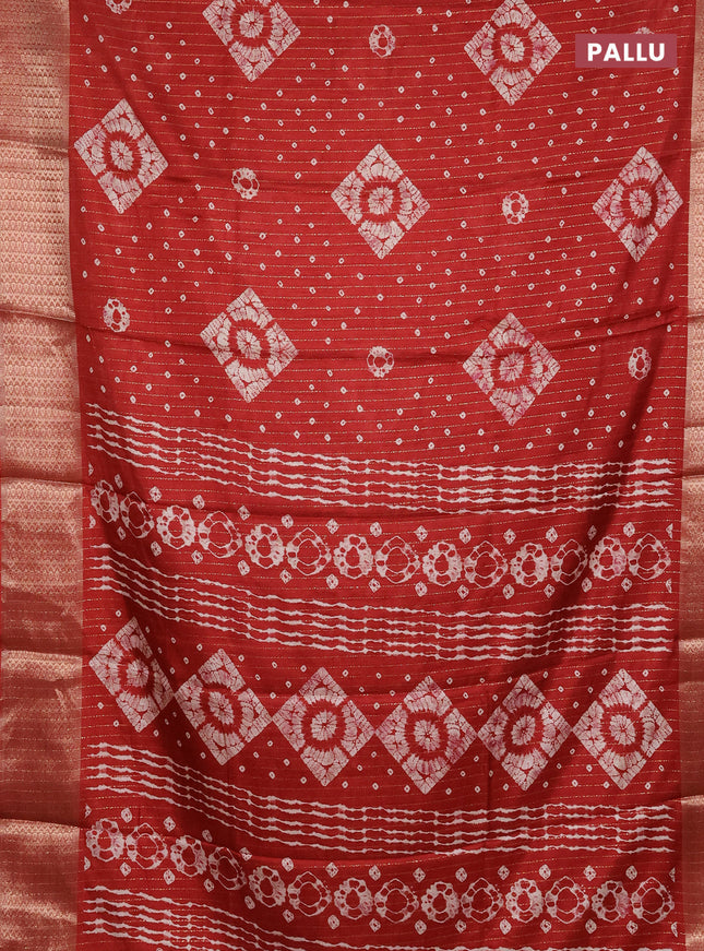 Semi dola saree maroon with allover zari weaves & batik prints and zari woven border